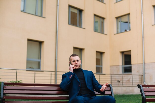 Businessman on a bench