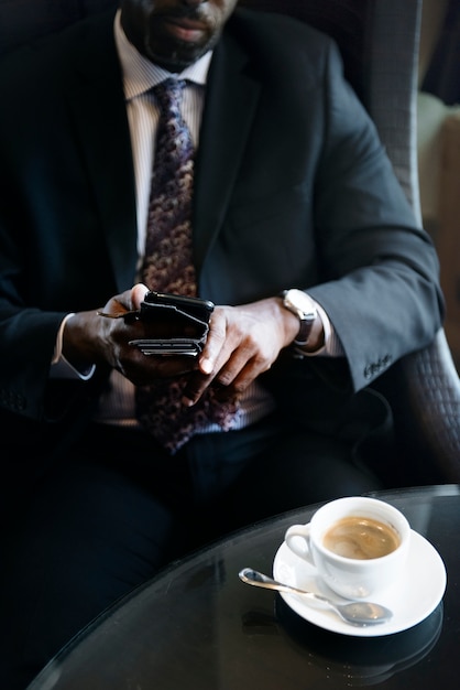 Businessman in cafe for a hot drink