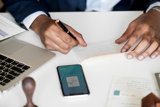 Businessman checking bankbook