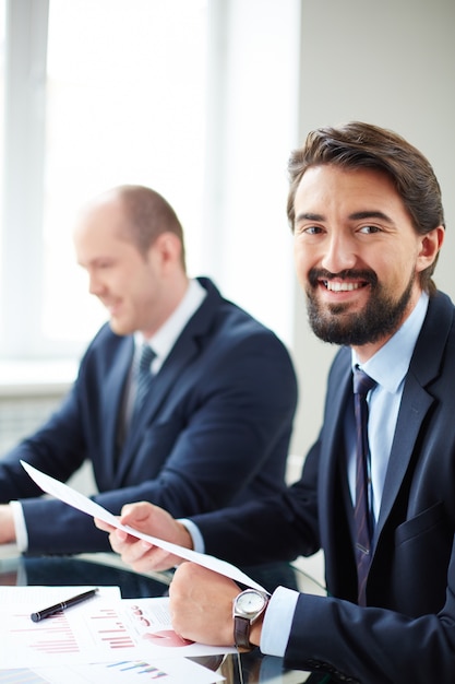 Free photo businessman checking a document