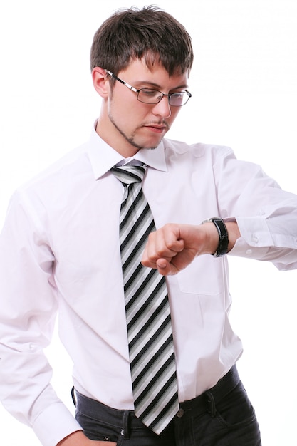 Businessman checking his wirts watches