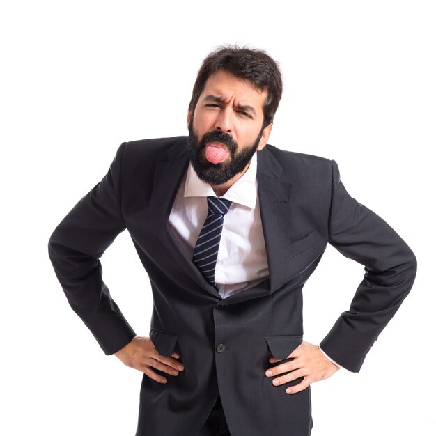 Businessman doing a joke over isolated white background