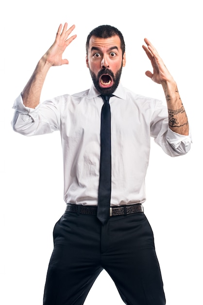 Free photo businessman doing surprise gesture