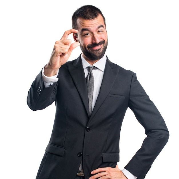 Businessman doing tiny sign