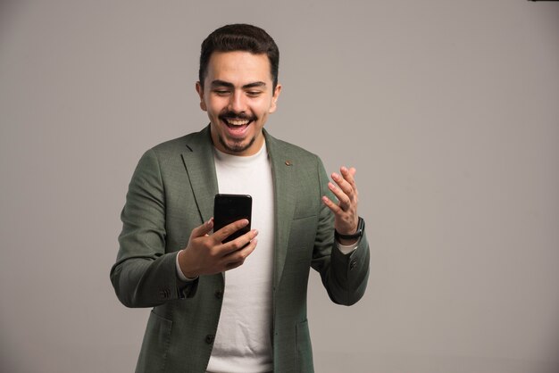 A businessman in dress code having a video call. 