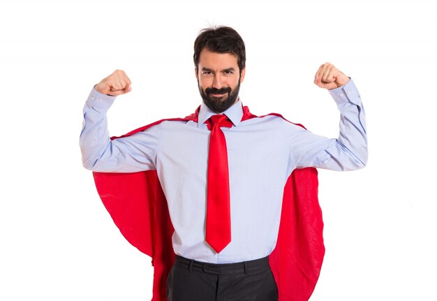 Businessman dressed like superhero proud of himself