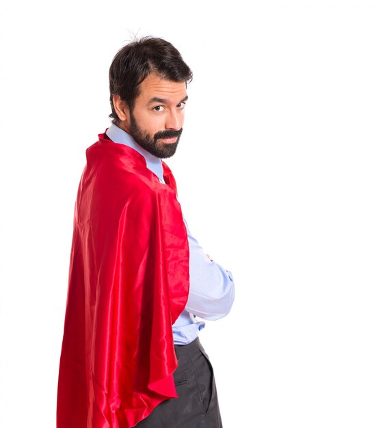 Businessman dressed like superhero proud of himself