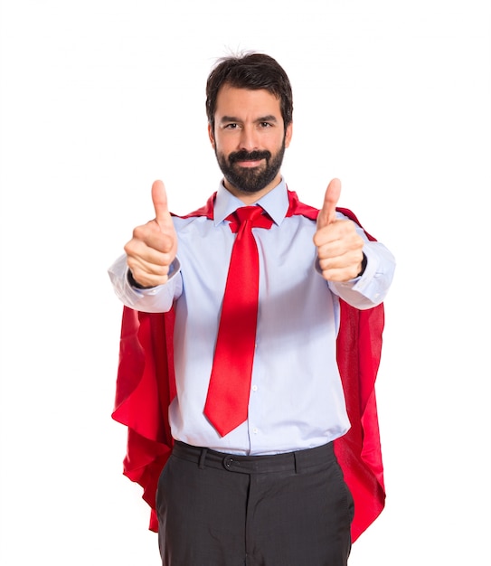 Бизнесмен одет как супергерой с пальца вверх