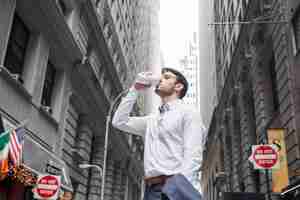 Free photo businessman enjoying hot beverage