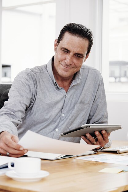 Businessman examining document