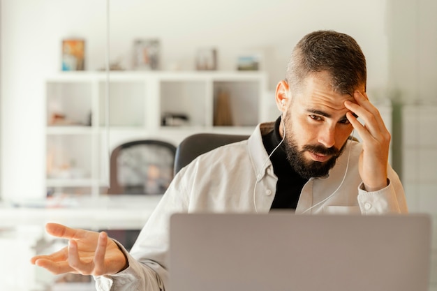 Businessman having a videocall for work