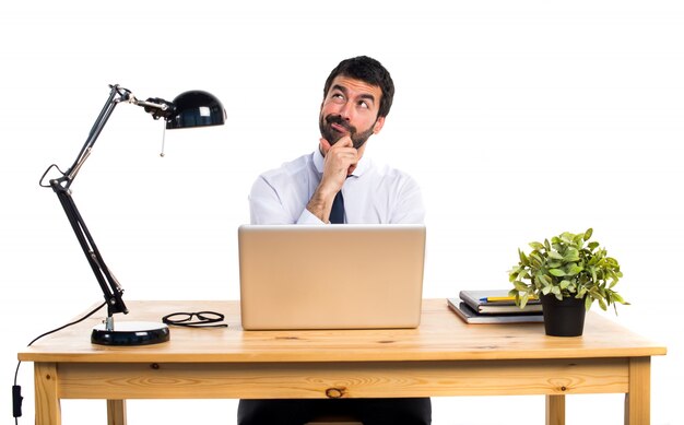 Businessman in his office thinking