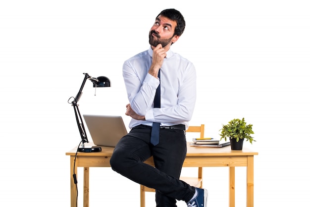 Businessman in his office thinking