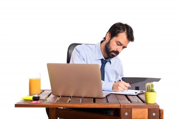 Businessman in his office with his folder