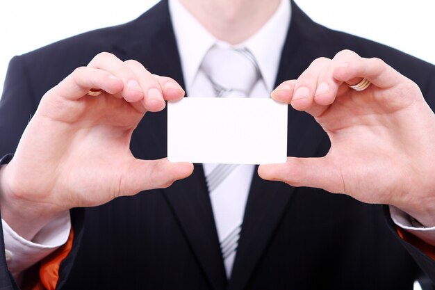 Businessman holding empty bussines card