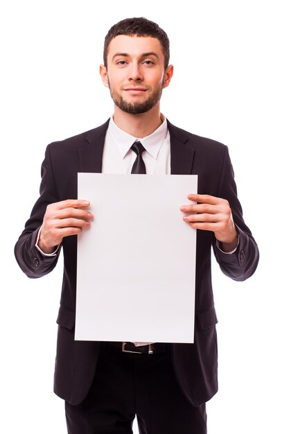 Businessman holding empty white placard showing copy space isolated on white