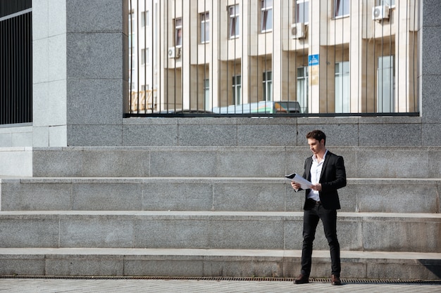 Businessman holding folder