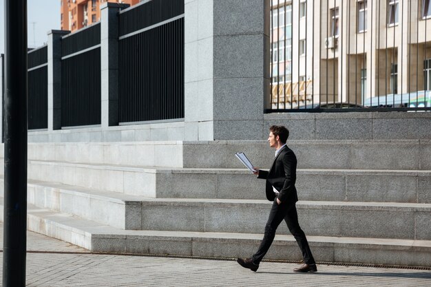 Businessman holding folder