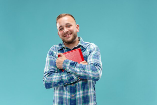 Businessman hugging laptop