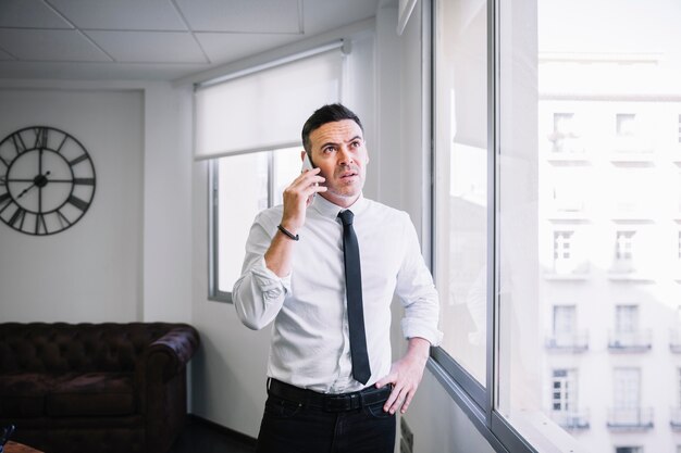 Businessman listening on phone