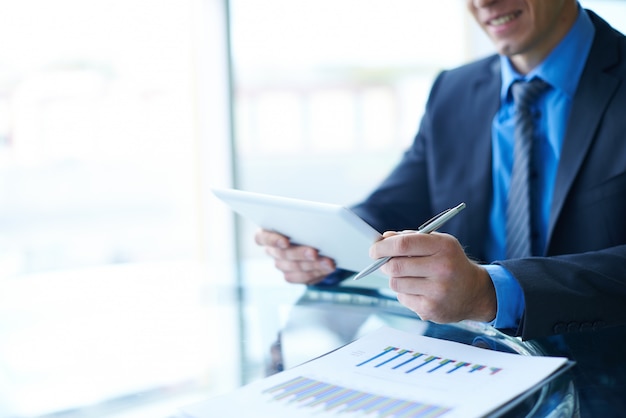 Businessman looking at a tablet