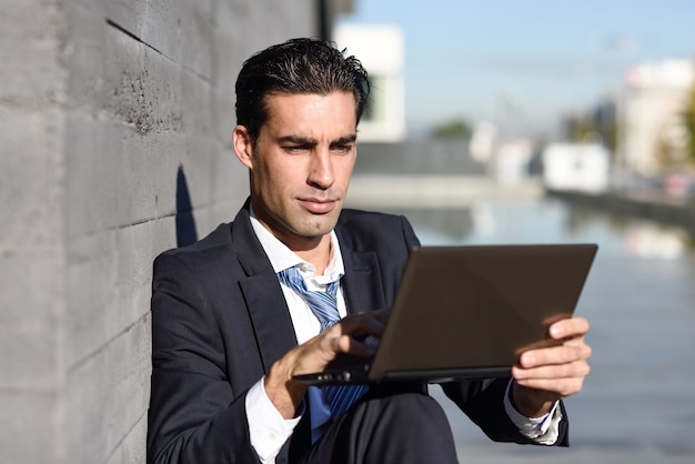 Businessman looking at a tablet