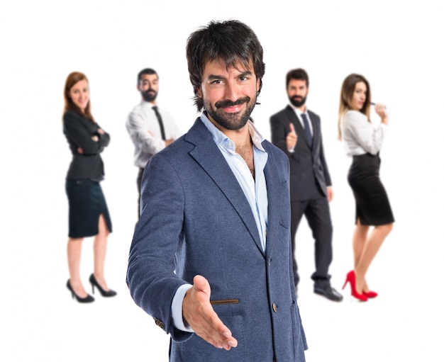 businessman making a deal over white background