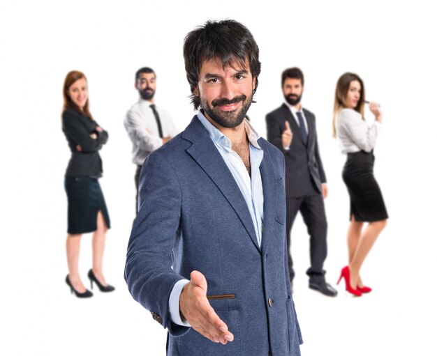 businessman making a deal over white background