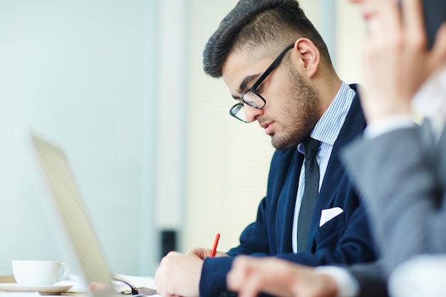 Businessman making notes