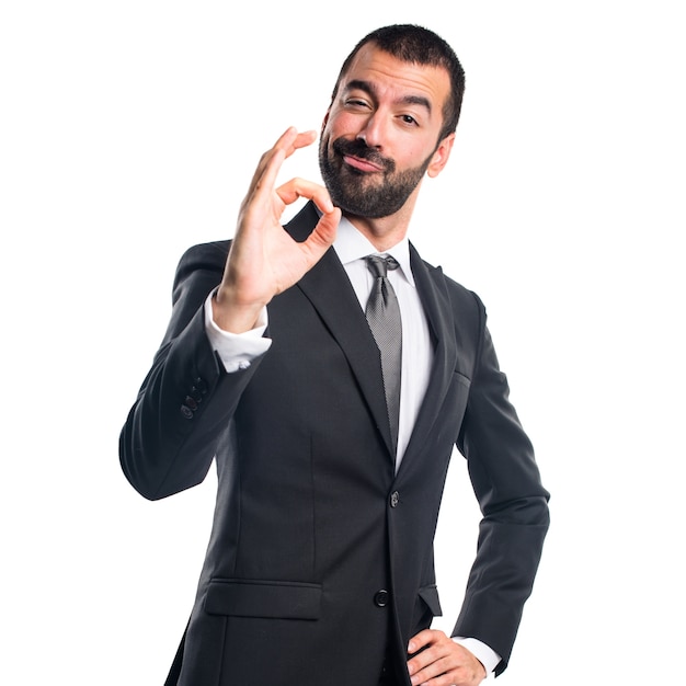 Businessman making OK sign