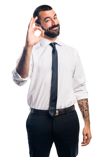 Businessman making OK sign