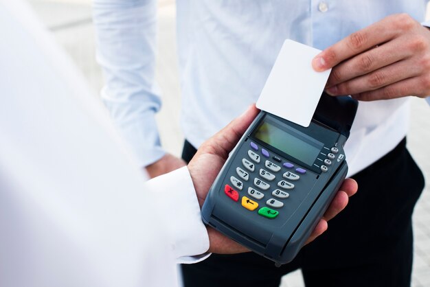 Businessman making a payment by card