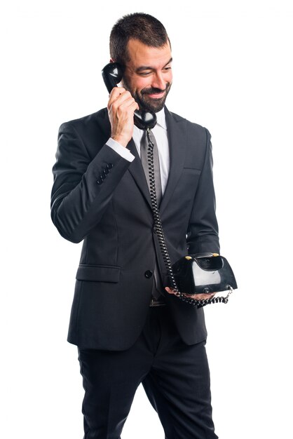 Businessman making phone gesture