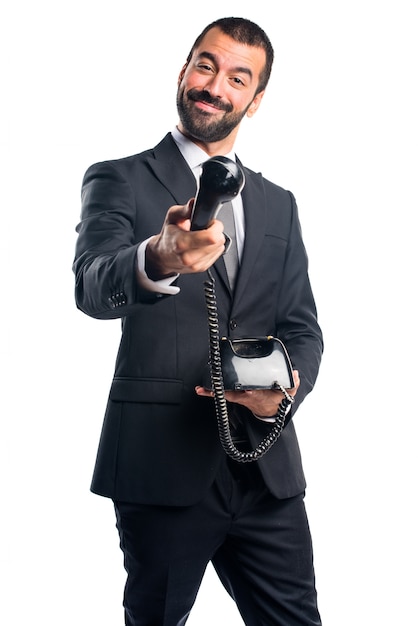 Businessman making phone gesture