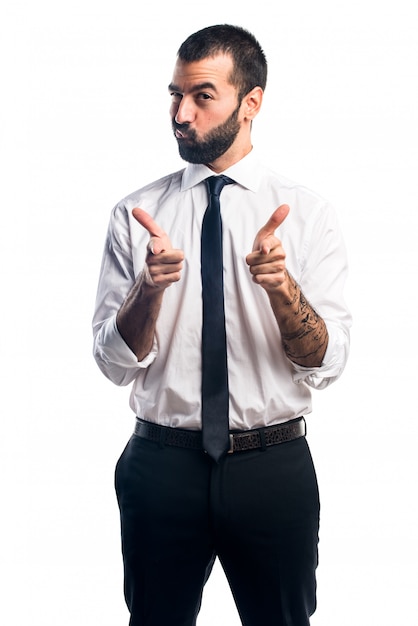 Free photo businessman pointing to the front