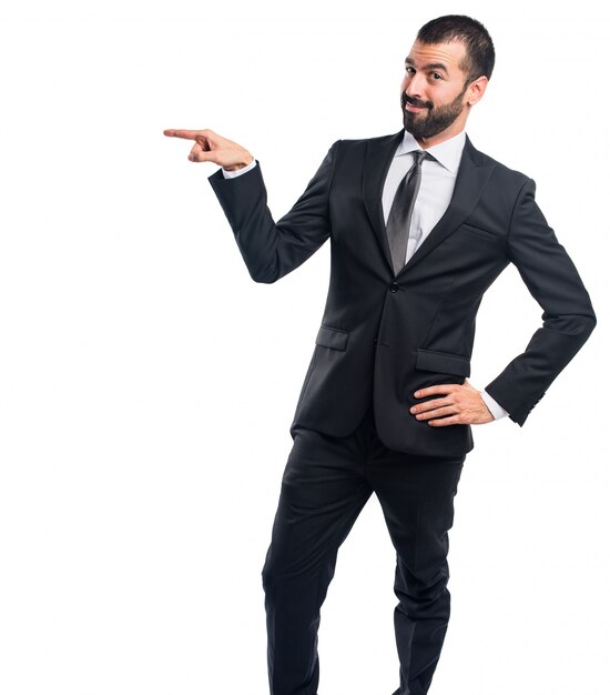 Businessman pointing to the lateral