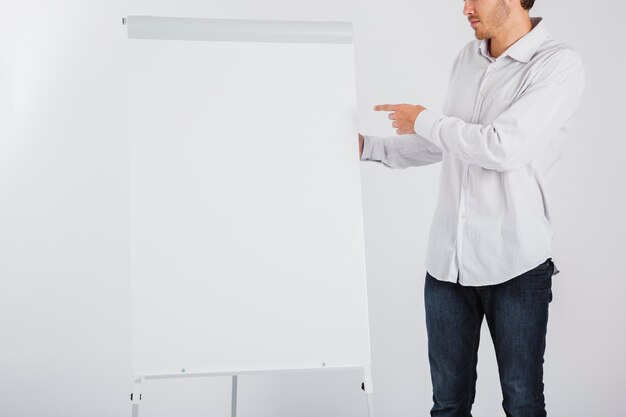 Businessman pointing whiteboard