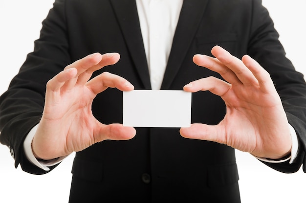 Businessman presenting business card with hands