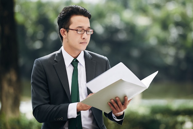 Businessman reading document