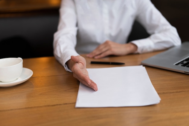 Free photo businessman ready to sign a deal at the office