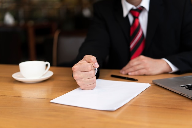 Businessman ready to sign a deal at the office