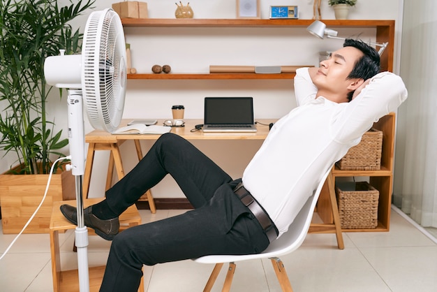 Businessman relaxing at office