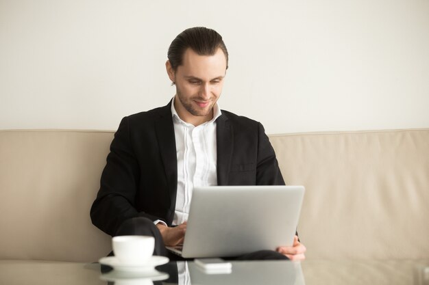 Businessman remotely managing his ecommerce company