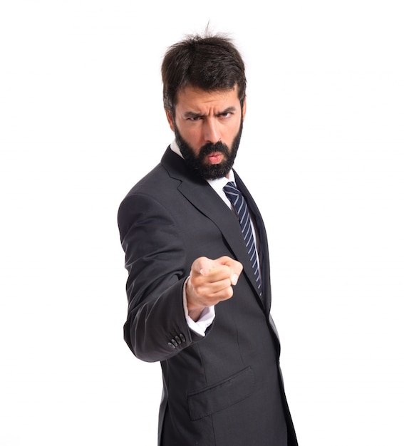 Businessman shouting over isolated white background