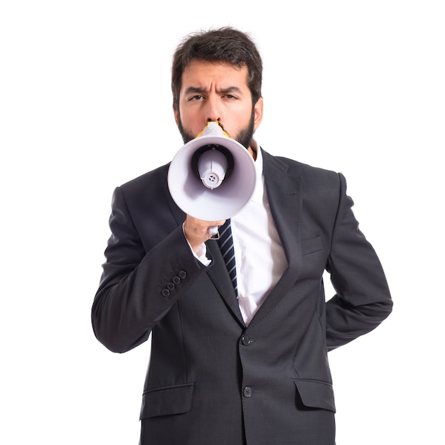 Businessman shouting over isolated white background