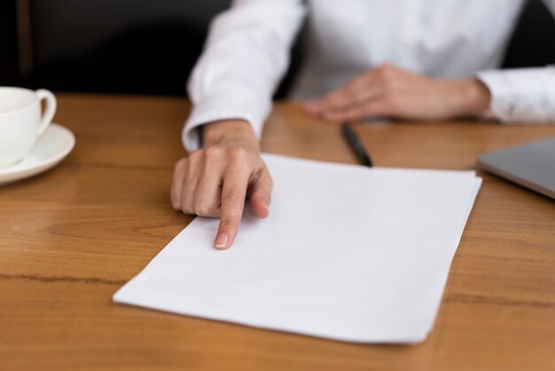 Businessman showing a contract at the office