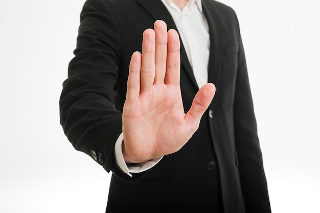 Businessman showing palm of hand