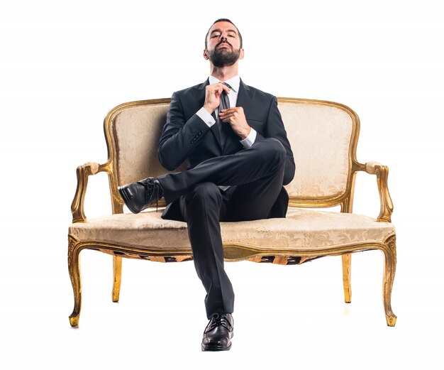 Businessman sitting on armchair