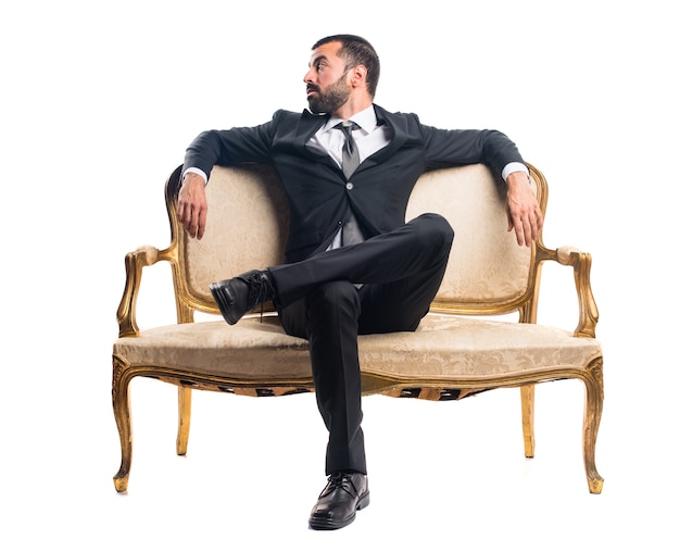 Businessman sitting on armchair
