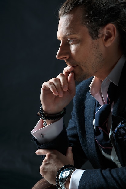 Businessman sitting on an armchair